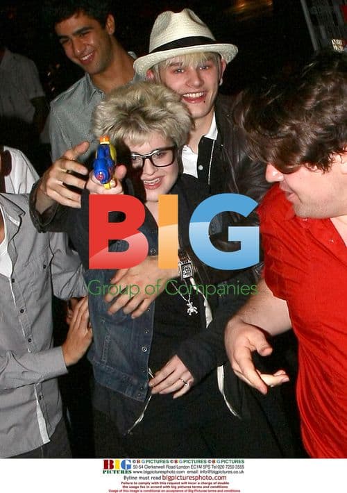 Kelly Osbourne and Luke Worrall play with water pistol