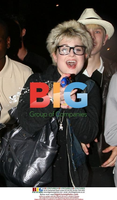 Kelly Osbourne and Luke Worrall have fun with water pistol