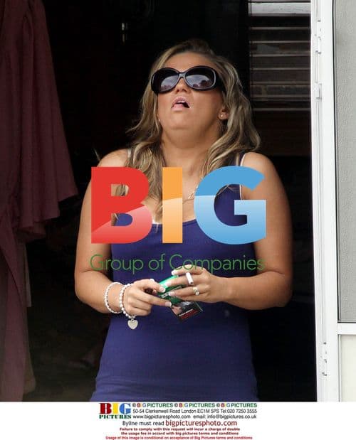 Kerry Katona Adjusts Undergarment