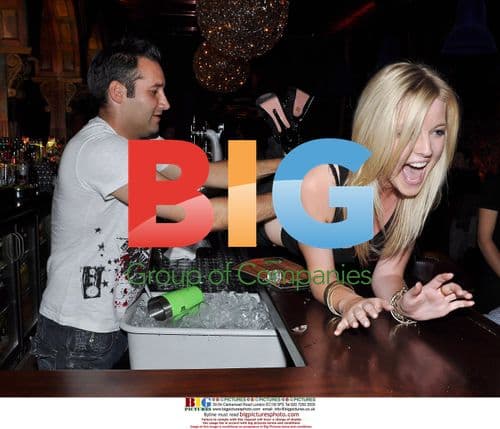 Singer Dane Bowers works as cocktail waiter