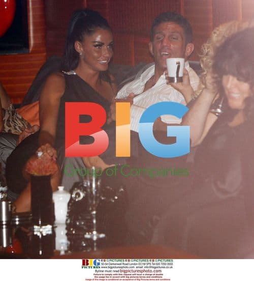 Katie Price parties with boyfriend and model