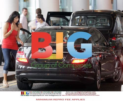 Christine Bleakley and Adrian Chiles Arrive at Airport