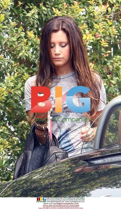 Ashley Tisdale Leaves Home in Acid Wash Jeans