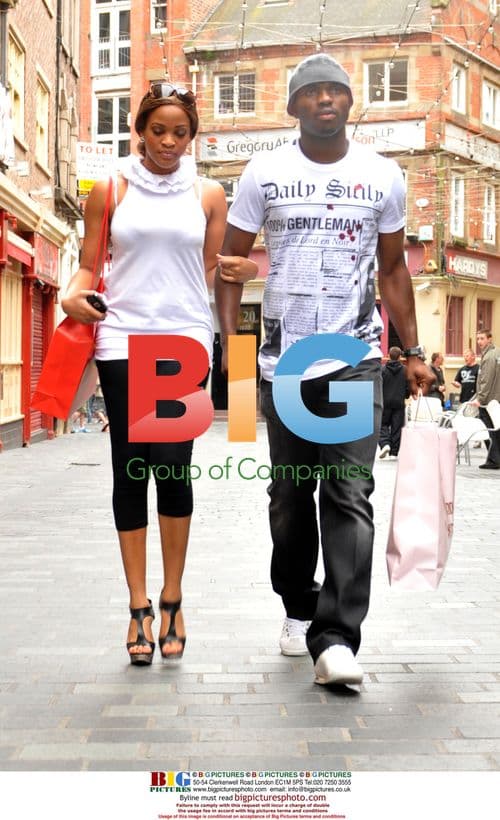 Everton's Joseph Yobo shopping with friend