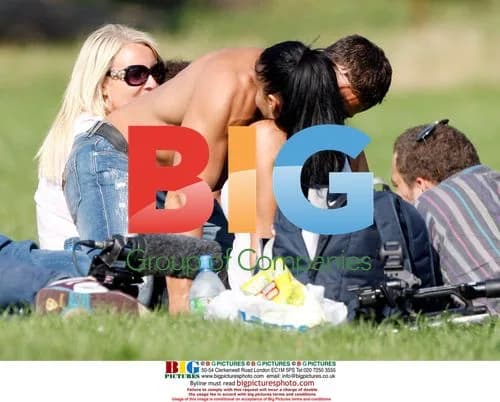 Katie Price and Alex Reid play with kids at stables