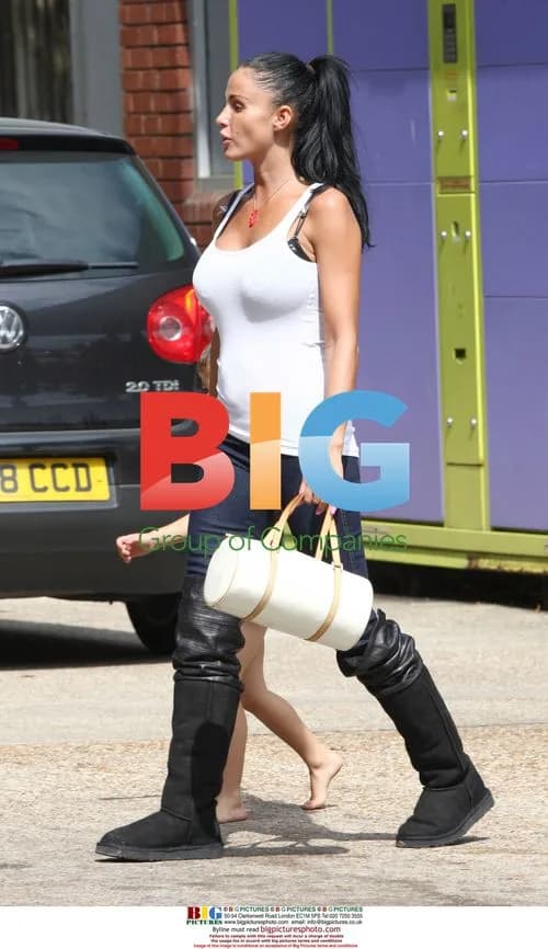 Katie Price and Alex Reid play football with sons