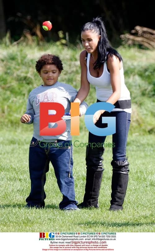 Katie Price and Alex Reid play football with sons