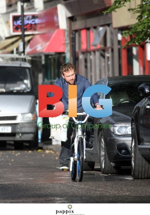 Blur Singer Damon Albarn Rides Bike in North London