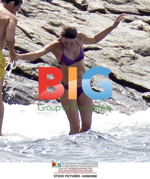 Carla Bruni-Sarkozy in Purple Bikini