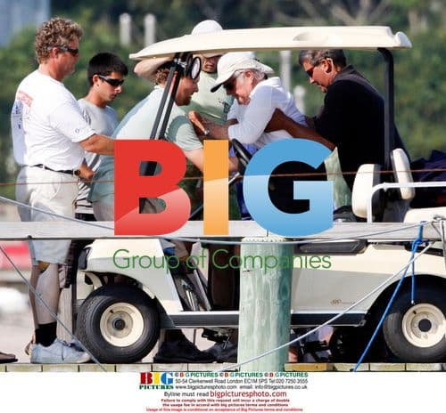 Ted Kennedy assisted onto boat