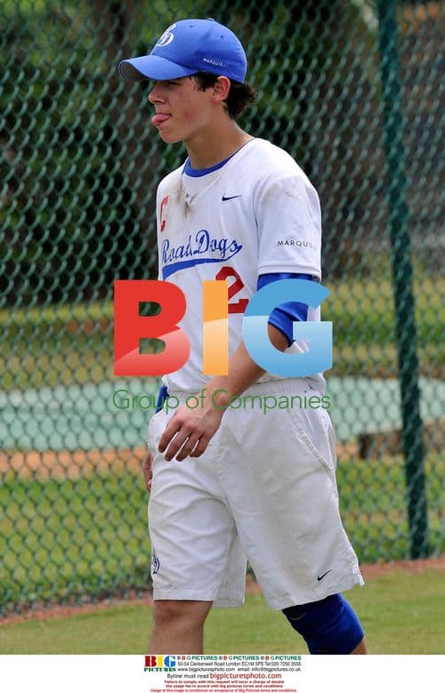 Nick Jonas playing softball with Road Dogs