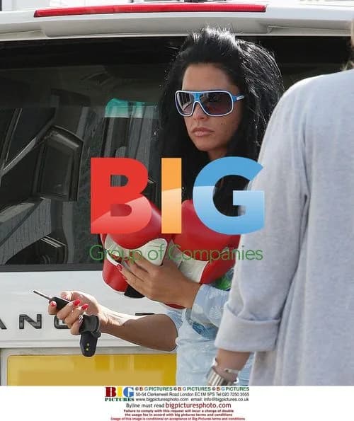 Katie Price leaves horse stables, stops for gas