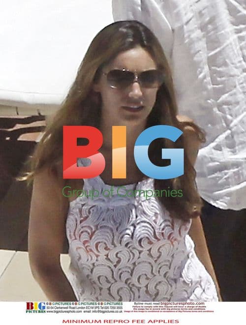 Kelly Brook and Danny Cipriani poolside