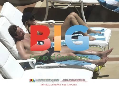Kelly Brook and boyfriend poolside in USA