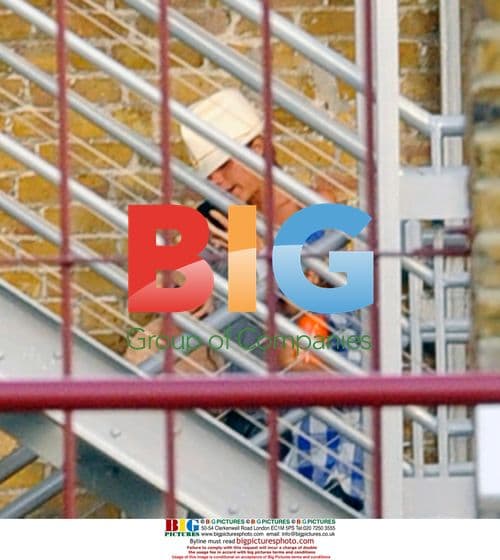 Victoria Beckham leaves 19 Entertainment with son Romeo