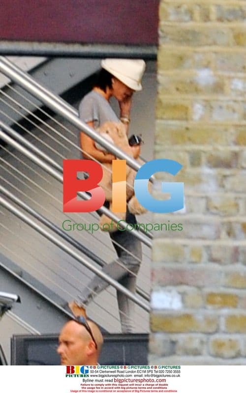 Victoria Beckham leaves 19 Entertainment with son Romeo