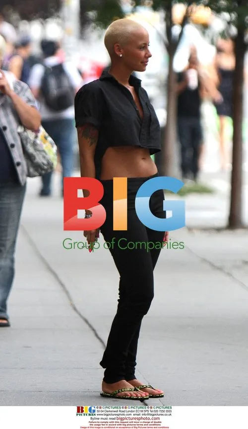 Amber Rose takes smoke break in NYC