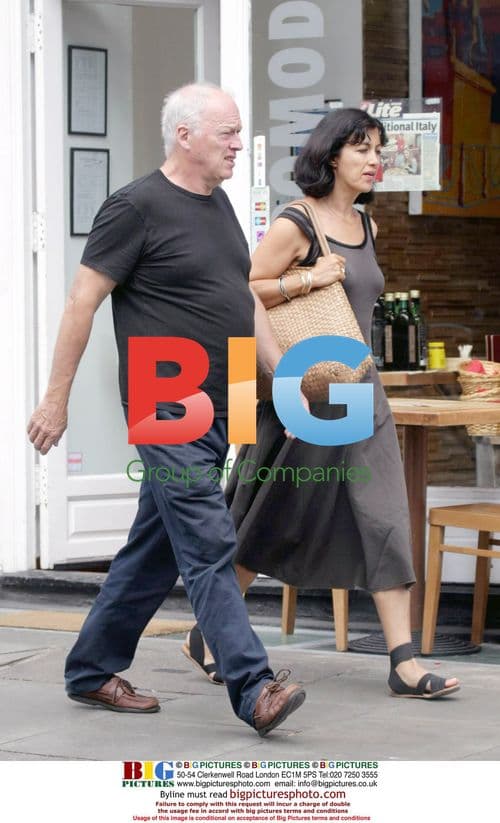 David Gilmour and Polly Samson walk in London