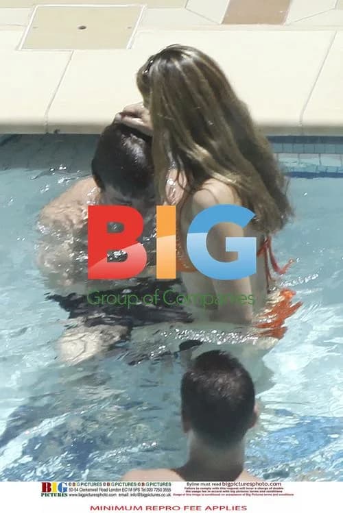 Kelly Brook and Danny Cipriani poolside
