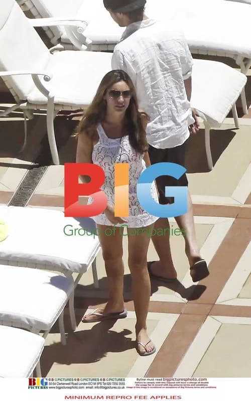 Kelly Brook and Danny Cipriani poolside