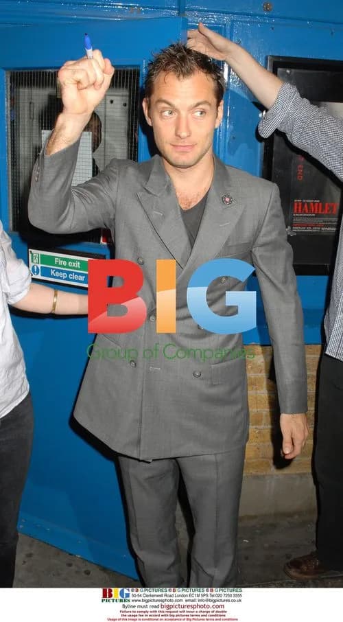 Jude Law signs autographs at Wyndham Theatre
