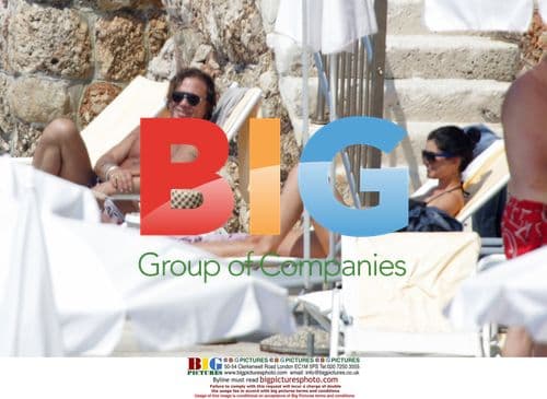 Mickey Rourke Relaxes on Croatian Beach