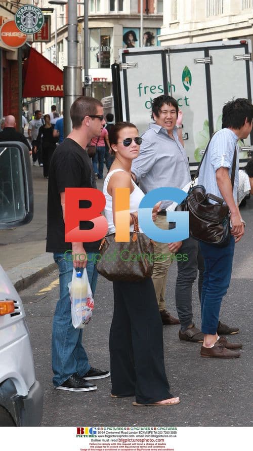 Australian cricketers loading coach with beer