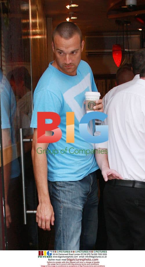 Australian cricket team with Aussie beer