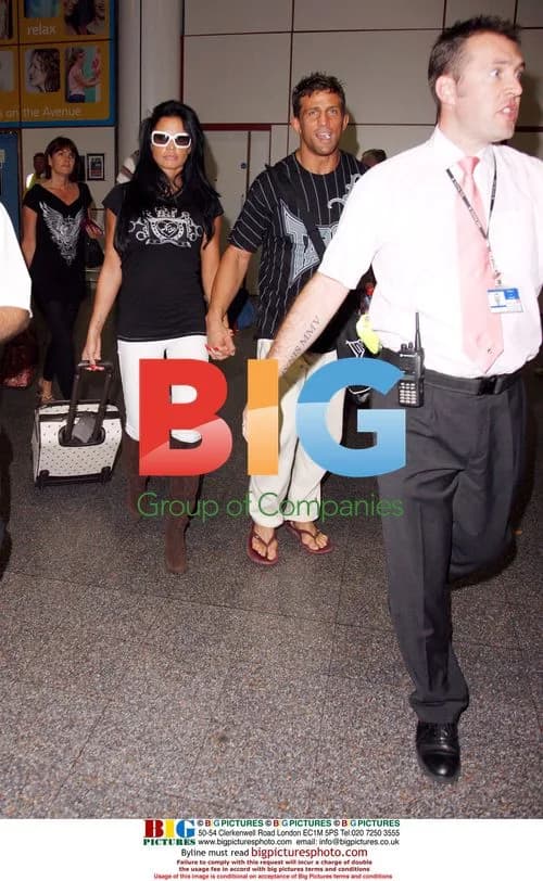 Katie Price and Alex Reid arrive at Gatwick Airport