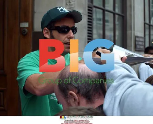 Adam Sandler signs autographs in London