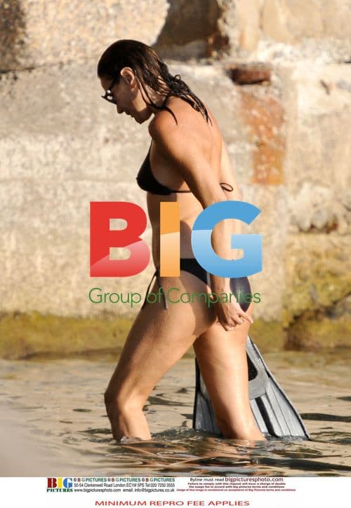 Sarkozy and Bruni Enjoy Swim at French Home