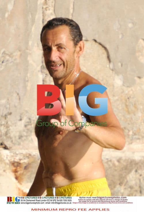 Sarkozy and Bruni swim at family home
