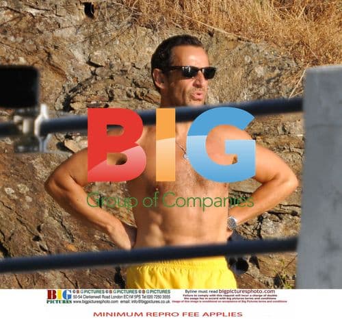 Sarkozy and Bruni Swim at Family Home