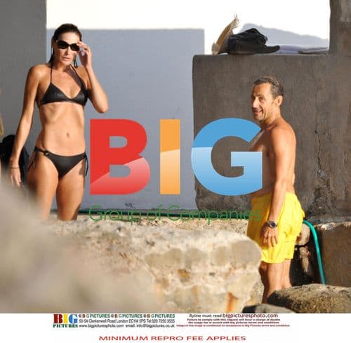 Sarkozy and Bruni swim at family home