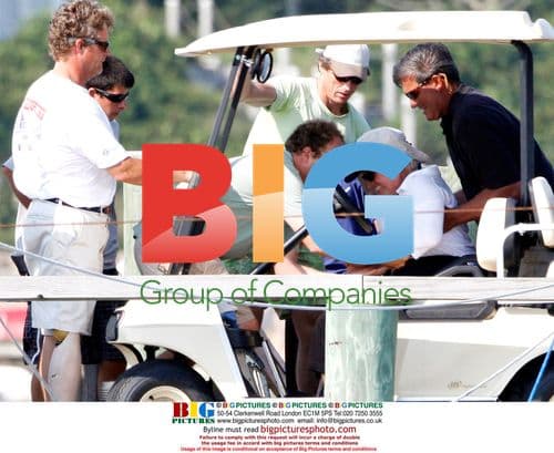 Ted Kennedy Helped onto Boat