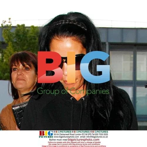 Shy Katie Price and Andrew Gould at airport