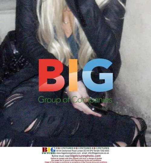 Lindsay Lohan Smoking on Floor