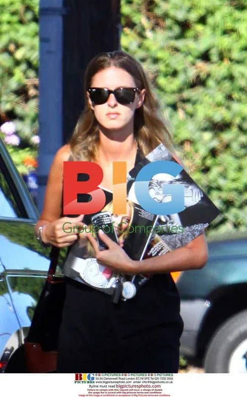 Nicky Hilton carries reading material in Beverly Hills