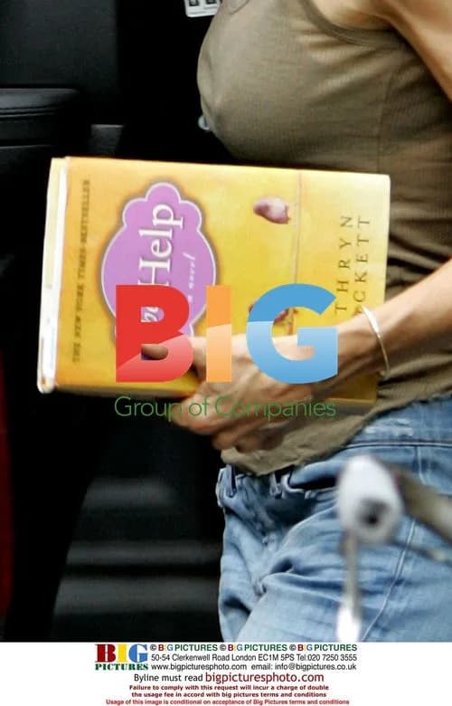 Sarah Jessica Parker Leaving Apartment with Book
