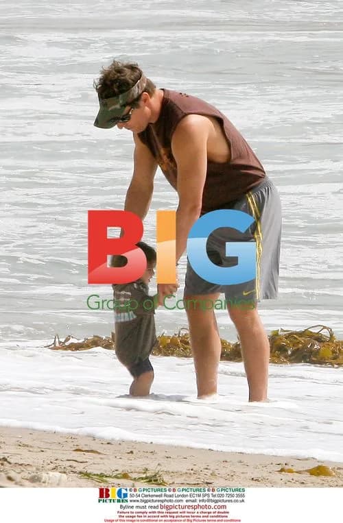 Matthew McConaughey at the beach with son