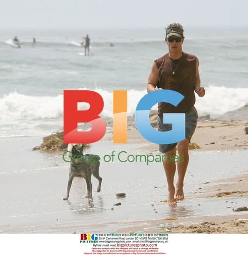 Matthew McConaughey and son at the beach