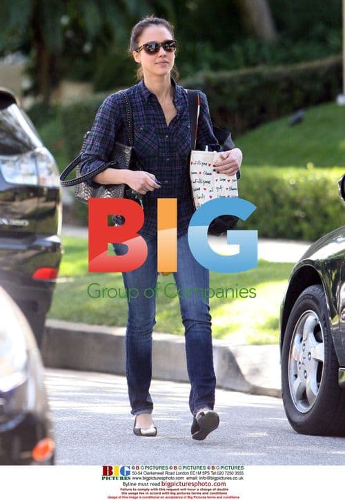 Jessica Alba carrying present in LA