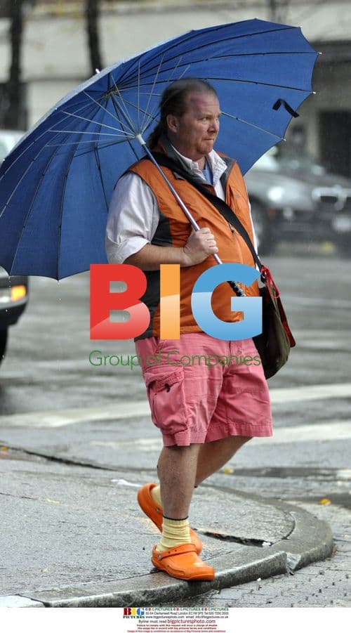 Mario Batali spotted in NYC rainy weather