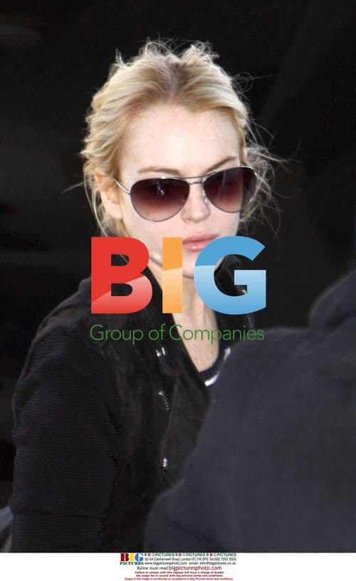 Lindsay Lohan Leaves NYC