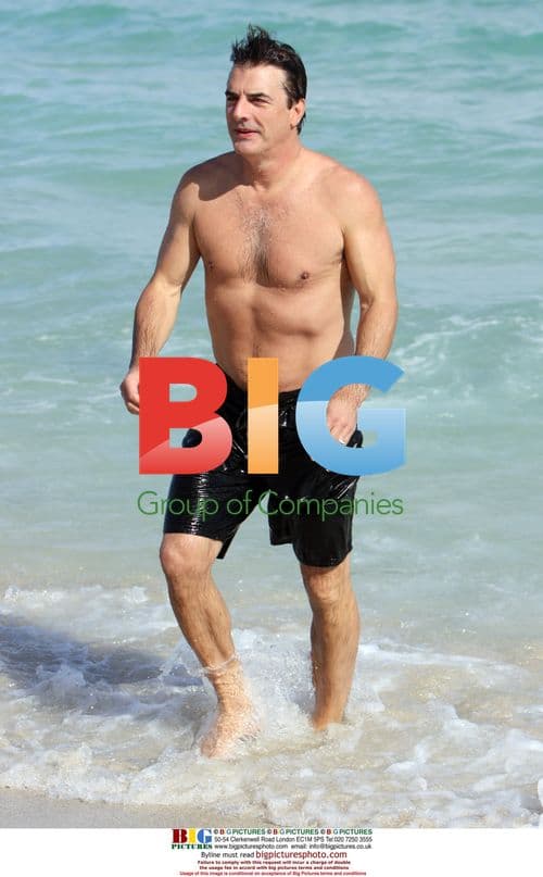 Chris Noth swimming at Miami Beach