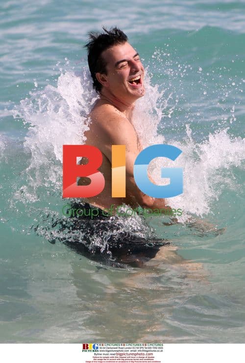 Chris Noth swimming on Miami Beach