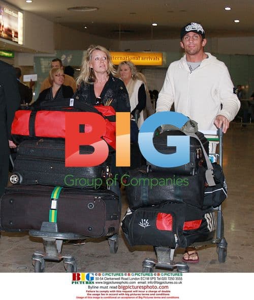 Alex Reid arrives back in London