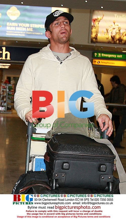 Alex Reid arriving in London from LA