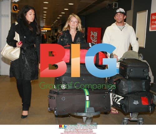 Alex Reid arrives in London from LA