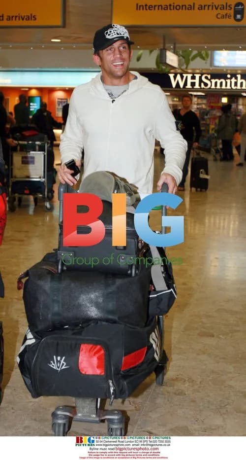 Alex Reid arrives in London from LA